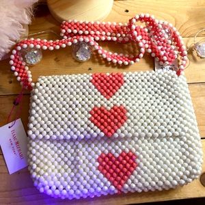 Isaac Mizrahi Whaite and pink